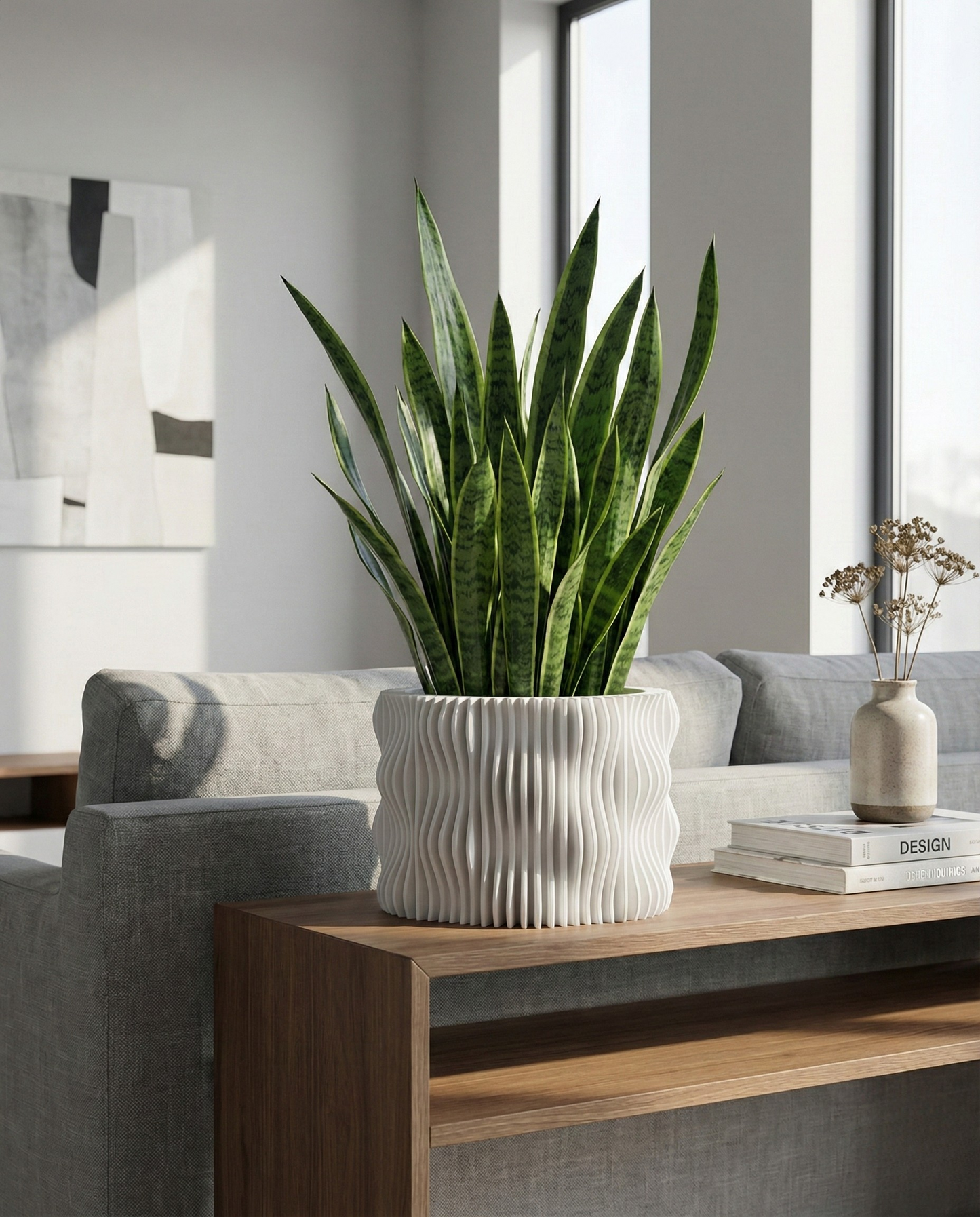 Potted snake plant on a wooden side table in a living room setting