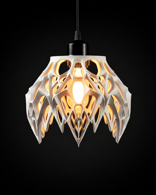Arachne pendant lamp illuminated against a black background