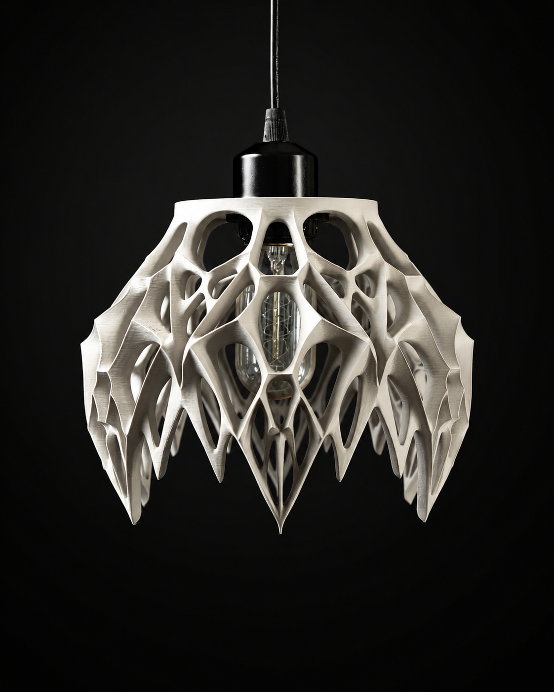 Arachne pendant lamp shade shown from the front with the bulb unlit