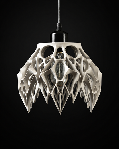 Arachne pendant lamp shade shown from the front with the bulb unlit
