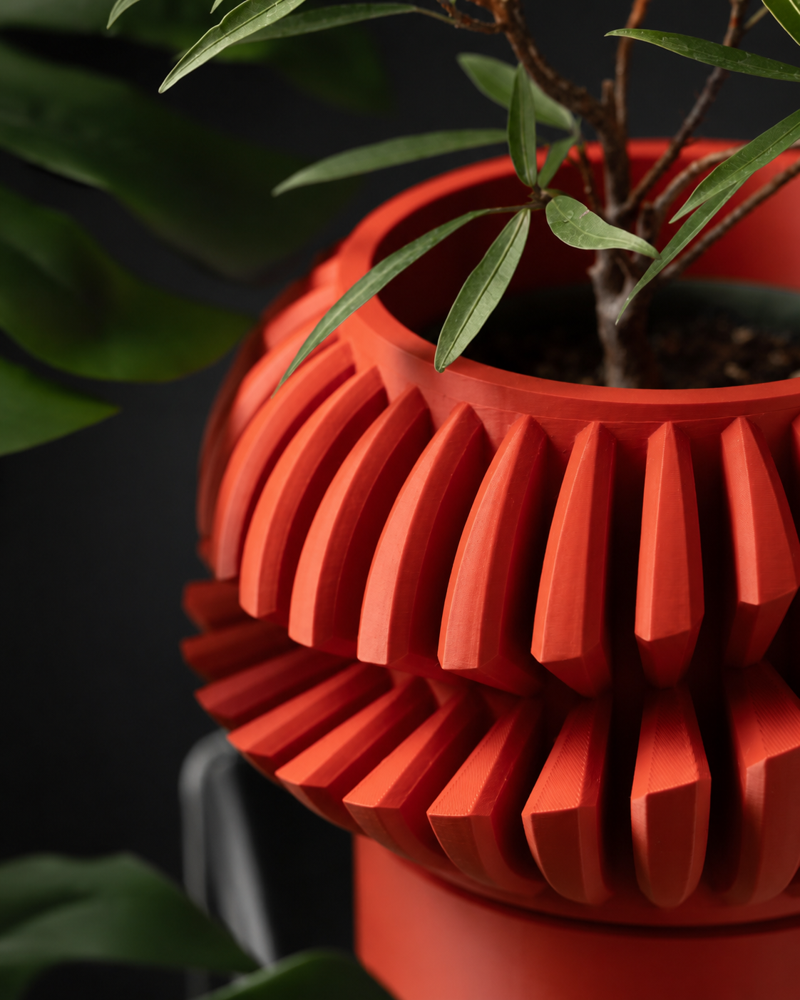 Close-up of The Luxe planter's layered sculptural texture